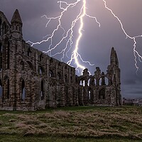 Buy canvas prints of Lightning over Whitby Abbey in Yorkshire by Tim Hill