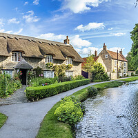 Buy canvas prints of Riverside Thatched Cottage by Tim Hill