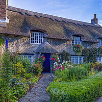 Buy canvas prints of Thatched Cottage, Thornton Dale, Yorkshire by Tim Hill