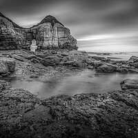 Buy canvas prints of Thornwick Bay Cliff Arch in Black and White by Tim Hill