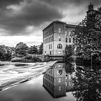 Buy canvas prints of Moody Reflections at Salts Mill Weir by Tim Hill
