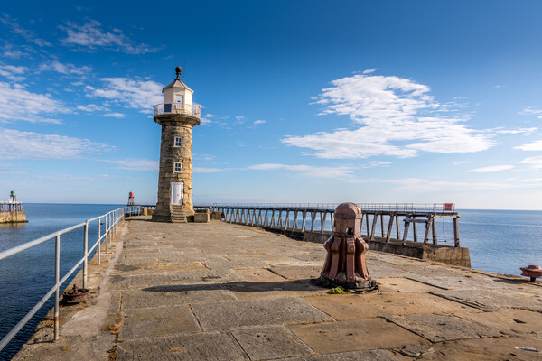 Guiding Light at Whitby Pier Picture Board by Tim Hill