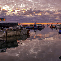 Buy canvas prints of Serene Sunrise Over Seahouses Harbor by Tim Hill
