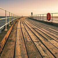 Buy canvas prints of Golden Sunrise at Whitby Pier by Tim Hill