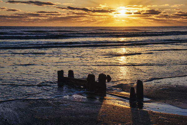 Golden rays over tranquil Sandsend Picture Board by Tim Hill