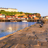 Buy canvas prints of Whitby East Cliff Photographed from Tate Hill Pier by Tim Hill