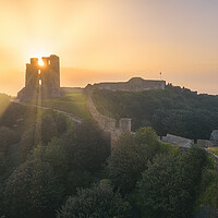 Buy canvas prints of Scarborough Castle Sunrise by Tim Hill