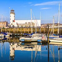 Buy canvas prints of Scarborough Lighthouse Reflections by Tim Hill