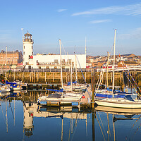 Buy canvas prints of Scarborough Lighthouse Reflections by Tim Hill