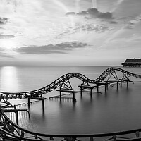 Buy canvas prints of Cleethorpes Beach Roller Coaster at Sunrise by Tim Hill
