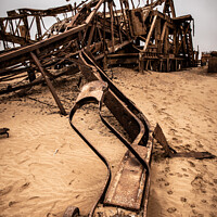 Buy canvas prints of Rusted remains at Skeleton Coast by Gunter Nuyts