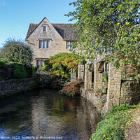 Buy canvas prints of A secluded cottage in Bourton on the water by Martin fenton