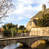 Buy canvas prints of Classic Cotswold house in Bourton on the water  by Martin fenton