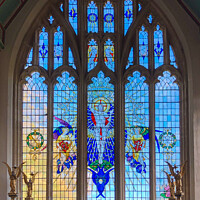 Buy canvas prints of Stained glass window in St Peter and St Paul church Northleach by Martin fenton