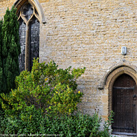 Buy canvas prints of St Lawrence church Bourton on the water.  Classic English church architecture  by Martin fenton
