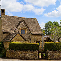 Buy canvas prints of Cotswold cottage Lower Slaughter by Martin fenton