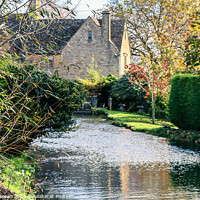 Buy canvas prints of Bourton on the water river by Martin fenton