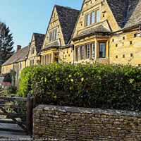 Buy canvas prints of Cotswold stone cottages Bourton on the water  by Martin fenton