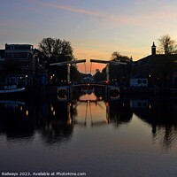 Buy canvas prints of Amsterdam canal at sunrise by Random Railways