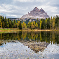 Buy canvas prints of Tre Cime di Lavaredo peaks and Lake Antorno with sky reflection  by Lubos Chlubny