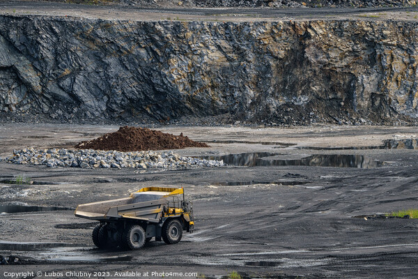 Dump truck in limestone mining, heavy machinery. Mining in the quarry. Picture Board by Lubos Chlubny