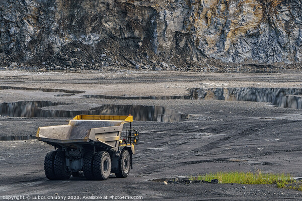 Dump truck in limestone mining, heavy machinery. Mining in the quarry. Picture Board by Lubos Chlubny