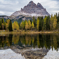 Buy canvas prints of Tre Cime di Lavaredo peaks and Lake Antorno with sky reflection  by Lubos Chlubny
