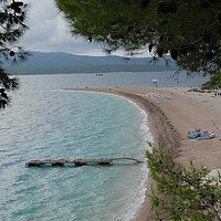 Buy canvas prints of Zlatni Rat famous turquoise beach view, Croatia by Irena Chlubna
