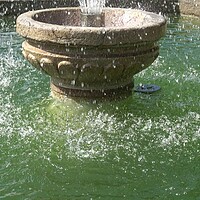 Buy canvas prints of Outdoor water fountain for garden decoration by Irena Chlubna
