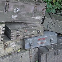 Buy canvas prints of A stack of old wooden military green boxes with ammunition. by Irena Chlubna