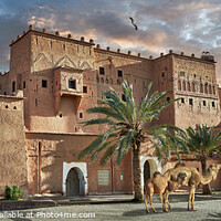 Buy canvas prints of The Imposing picturesque Berber Kasbah Palace of Taourirt at sunrise by Paul E Williams