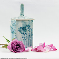 Buy canvas prints of Rose and Blue Ceramic Pot by Jean Gilmour