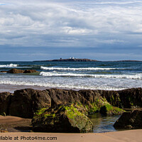 Buy canvas prints of Looking across to The Farne Islands from Banburgh Beach by Jean Gilmour