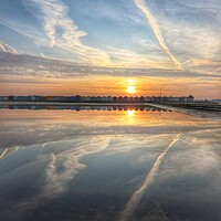 Buy canvas prints of Brightlingsea tidal pool sunrise reflections by Tony lopez