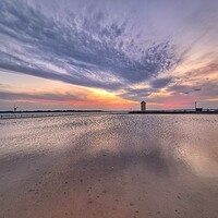 Buy canvas prints of Sunset cloudscape and colours over the Brightlingsea tidal pool and Batemans Tower.  by Tony lopez