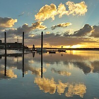 Buy canvas prints of Glorious Sunrise cloudscape reflections over the Brightlingsea Harbour  by Tony lopez