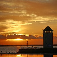 Buy canvas prints of Sunset over the Batemans Tower in Brightlingsea essex at sunset  by Tony lopez