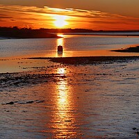 Buy canvas prints of Sun setting across the Brightlingsea Creek.  by Tony lopez
