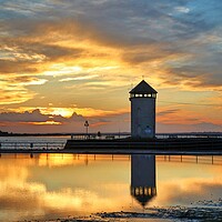 Buy canvas prints of Brightlingsea sunset over batemans tower giving great colours and reflections  by Tony lopez