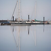 Buy canvas prints of Morning calm over Brightlingsea Harbour with great reflections  by Tony lopez