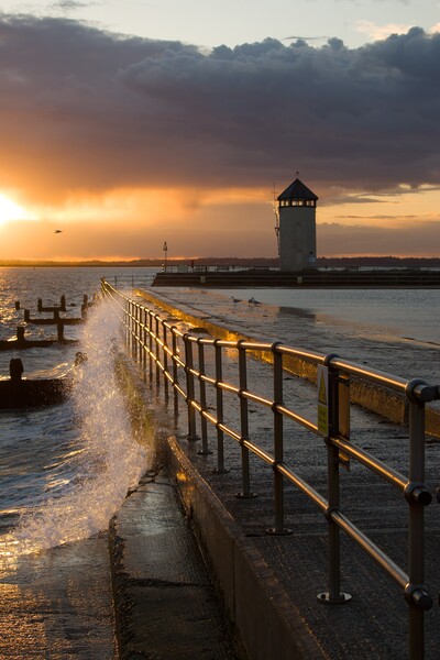 Sunset over Batemans Tower in Brightlingsea essex. Picture Board by Tony lopez