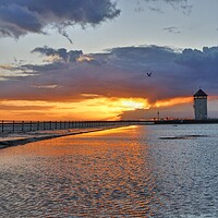 Buy canvas prints of Sun setting over the tidal pool in Brightlingsea  by Tony lopez