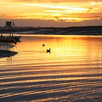 Buy canvas prints of Golden sunrise over the Brightlingsea Creek  by Tony lopez