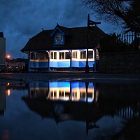 Buy canvas prints of Tha hard shelter in Brightlingsea in reflection  by Tony lopez