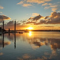 Buy canvas prints of Sunrise reflections over Brightlingsea Harbour  by Tony lopez