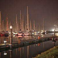 Buy canvas prints of Evening light reflections over the Shotley marina  by Tony lopez
