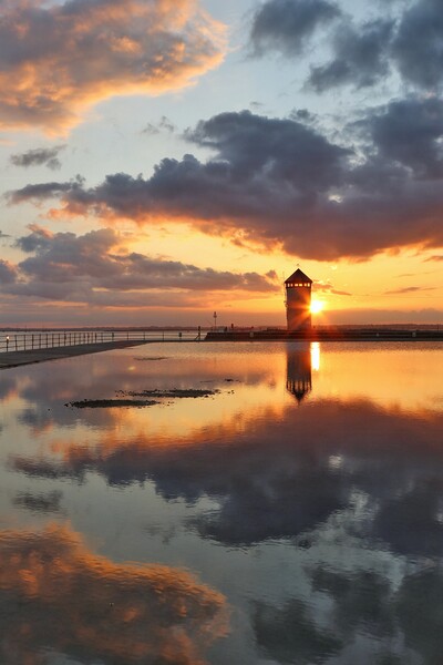 Peaceful reflections over Batemans Tower in Brightlingsea  Picture Board by Tony lopez