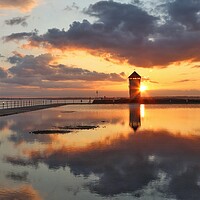 Buy canvas prints of Peaceful reflections over Batemans Tower in Brightlingsea  by Tony lopez