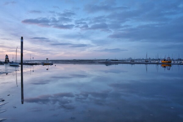 Pre sunrise cloud and reflections over the Brightlingsea Harbour  Picture Board by Tony lopez