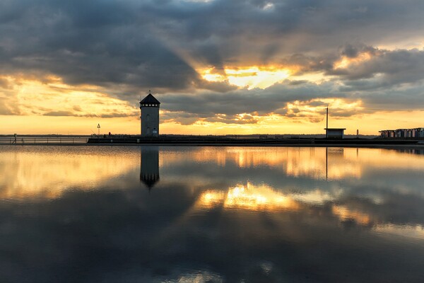 Sunset colours and reflections over Brightlingsea tidal pool  Picture Board by Tony lopez